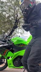 Biker Shares Snacks With Squirrel