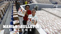 Mayor Honey, VM Yul inspect 870,000 Christmas boxes for Manileños