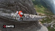 Climber makes nail-biting 2,019m ascent on limestone ridge - no wider than his SHOULDERS