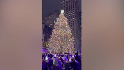 Watch moment New York City’s 80-foot Christmas tree lights up