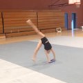 Young Gymnast Showcases Impressive Flexibility With Hands Tied