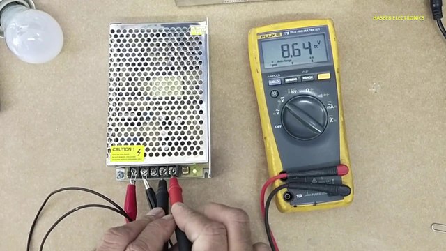 SMPS output voltage fluctuating, unregulated output