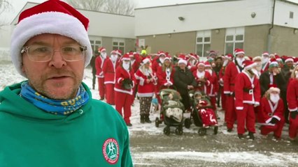 Watch 100 people set off on the Drighlington Dynamos Santa Stroll