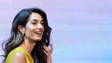 Amal Clooney Proved that Barbiecore Isn't Over in a Hot Pink Crop Top