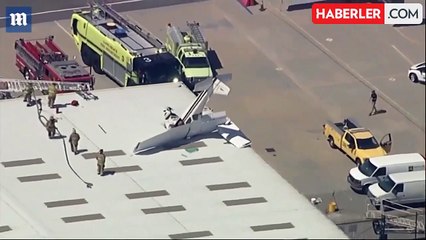 Uçak burun üstü hangarın çatısına çakıldı! Pilot mucizevi şekilde kurtuldu