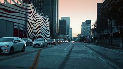 Tracking Shot Of Streets And Petersen Automotive Museum At Los Angeles In 4K Car Driver View.
