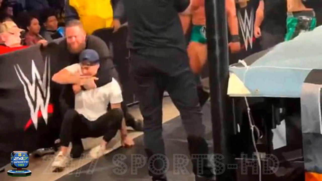 Shocking Moment- WWE Angry Fan Jumps Barricade to ATTACK Wrestling Star Grayson Waller in Newark