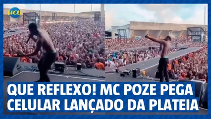 Que reflexo! MC Poze pega celular lançado da plateia