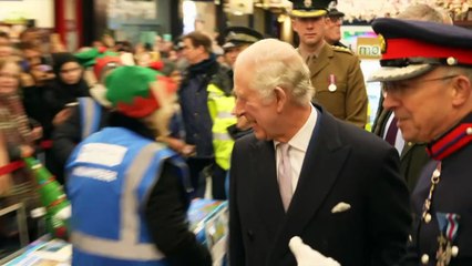 King has banter with Santa at Ealing Christmas market