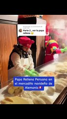 Mujeres peruanas preparan papa rellena en Alemania