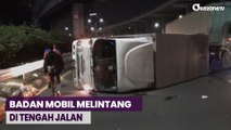 Mobil Boks Angkut Sayur Terguling di Jalan Tol Dalam Kota