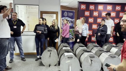 Employees at Corby’s RS give up time to build washing machines for families in need