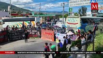 Estudiantes de Ayotzinapa bloquean Autopista del Sol por normalistas asesinados