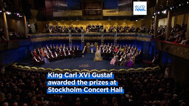 Children of imprisoned Iranian activist Narges Mohammadi accept her Nobel Peace Prize