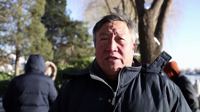 Swimmers take icy plunge on Beijing's coldest weekend