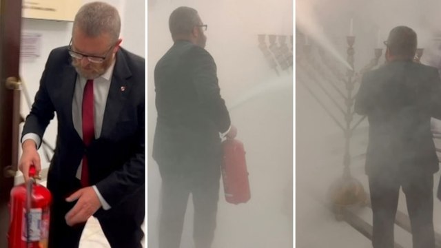 Polonya Meclisi'nde sıra dışı anlar... Vekil, mumları yangın tüpüyle söndürdü