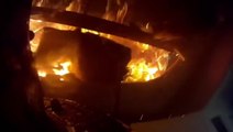 Firefighters battle through raging house fire in intense bodycam footage