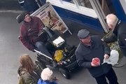 Shocking moment a pensioner on a mobility scooter knocks down another elderly man during a row about a pasty.