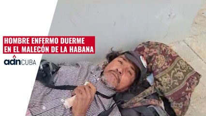 Hombre enfermo duerme en el malecón de la Habana