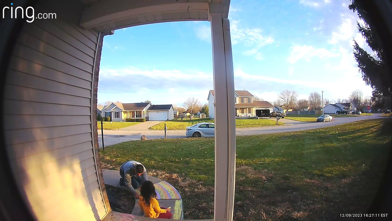 Father-Daughter Moment Caught on Doorbell Cam