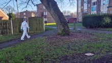 Crime Scene Investigator leaves block of flats on Ironside Walk in Sheffield