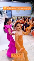 شبيهة ام فستان بنفسجي جابت العيد