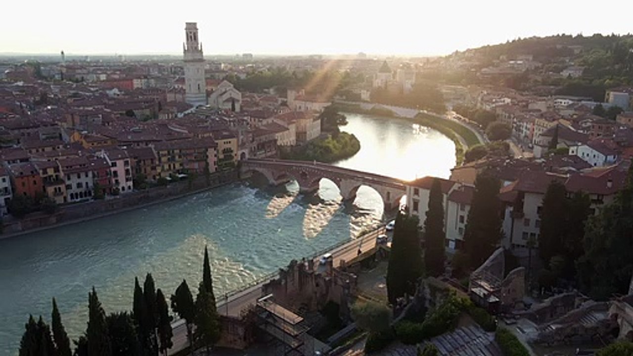Aerial drone footage of Ponte Pietra Bridge in Verona.