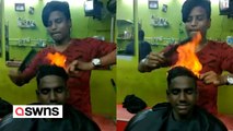 Ein Friseur schneidet Haare mit FEUER und zwei Kämmen