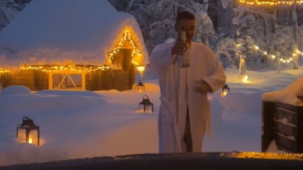 'So cold!' - Man taking a hot spa jumps in the cold snow for fun