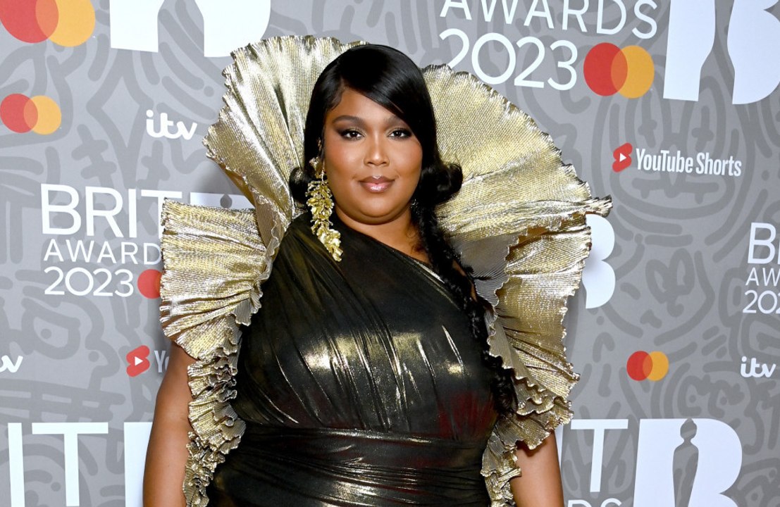 Lizzo has requested a "meritless and salacious" lawsuit be dismissed after her tour stylist alleged she faced fat-shaming and racism while working for the star.