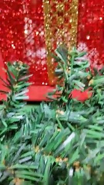 Christmas decorations . Happy Christmas celebration. This video is entertaining because the Santa Claus is dancing and with so many gifts also available for you.