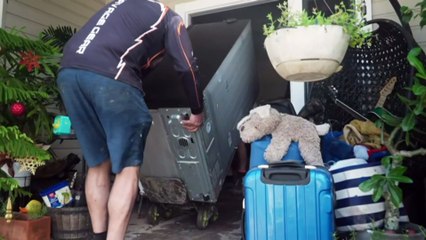 Residents return to flood-ravaged properties in Cairns