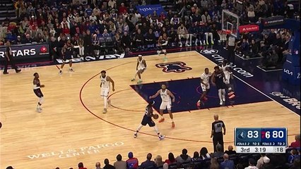 Embiid spins past Reid for the reverse dunk