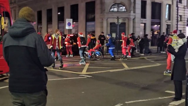 Santa Claus saves fuel money by choosing roller-blades as his mode of transport