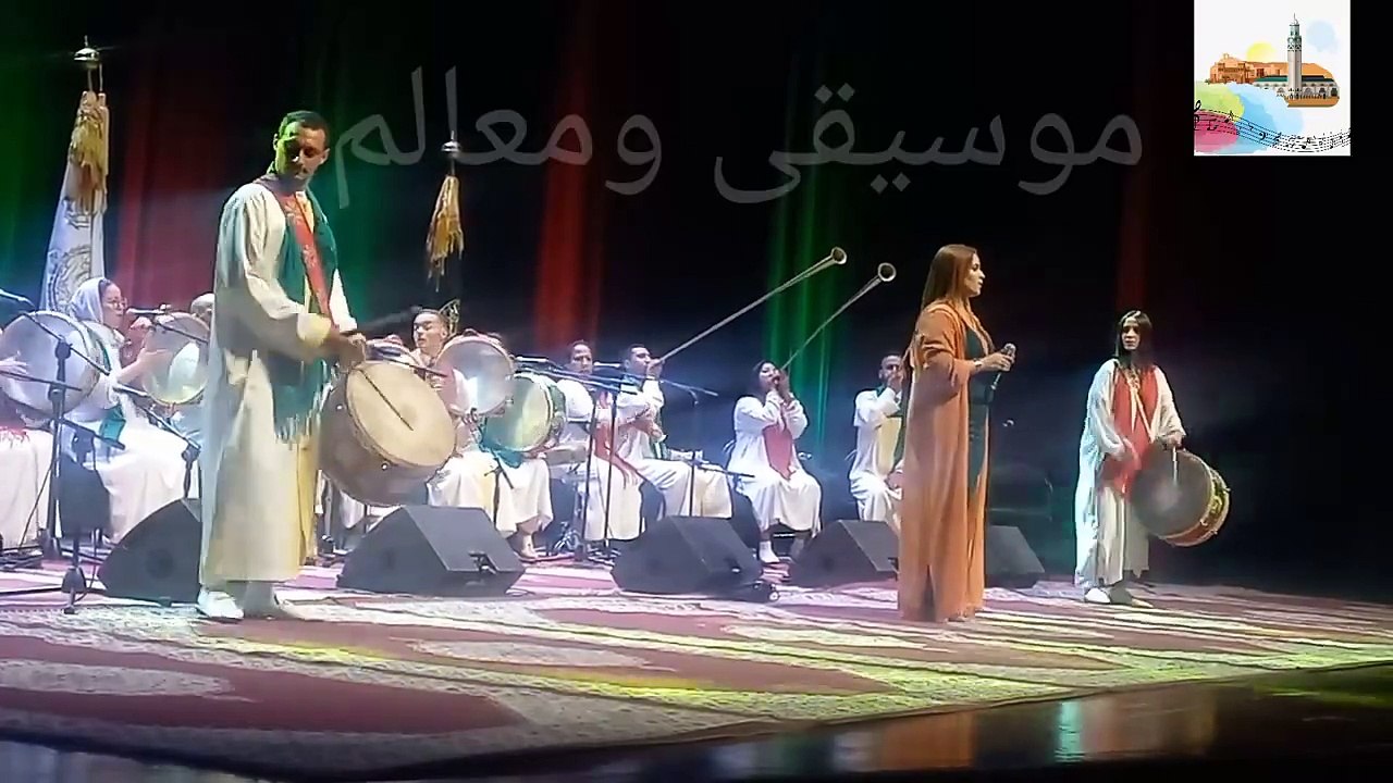 الطائفة العيساوية النسوية السلاوية برآسة المقدمة عائشة الدكالي تبهر جمهورها.issawa music