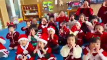 Merry Christmas : Children receive gifts from Santa Claus
