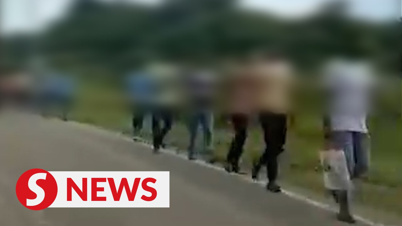 Foreigners march to police station to lodge complain, instead  get hauled up by Immigration Dept