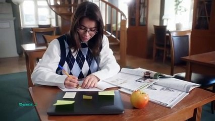 Two girls studying in the library with Rai music