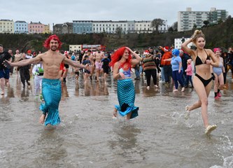 Hundreds of Disney characters take to the sea for Tenby's Boxing Day Swim 2023