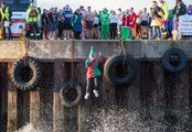 Dozens take Boxing Day plunge into Burghead harbour waters for charity