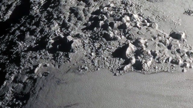 WATCH: NASA's New Horizons spacecraft flying over mountains on Pluto