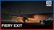 Japan Airlines passengers flee burning plane in Tokyo