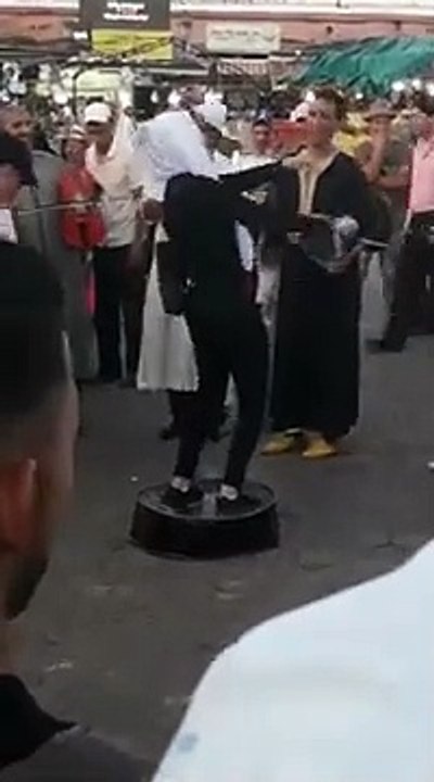a moroccan girl dancing the famous moroccan  dance