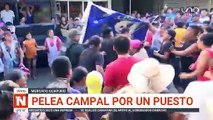 Pelea campal por un puesto en el mercado Guapurú