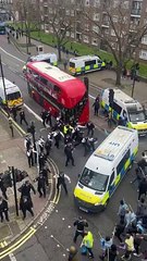 BREAKING: Eritrean rioters armed with long sticks attack the police in London