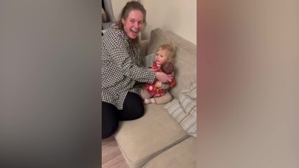 Toddler meets her baby brother for first time