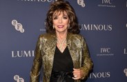 Dame Joan Collins couldn't move for two months after suffering from a trapped nerve
