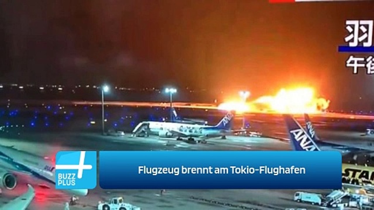 Flugzeug brennt am Tokio-Flughafen