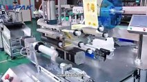 Machine à étiqueter semi-automatique pour tubes souples