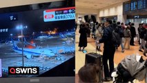 Scenes at Haneda Airport in Japan after plane catches fire following collision